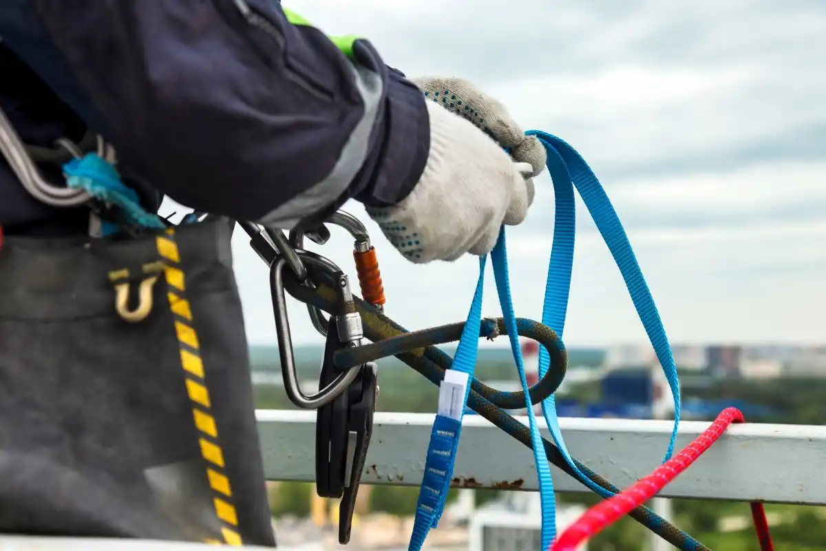 Slings and karabiners prepared for anchoring on a railing